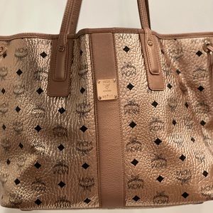 Rose Gold MCM authentic tote bag. Never worn/used. Does not include clutch.